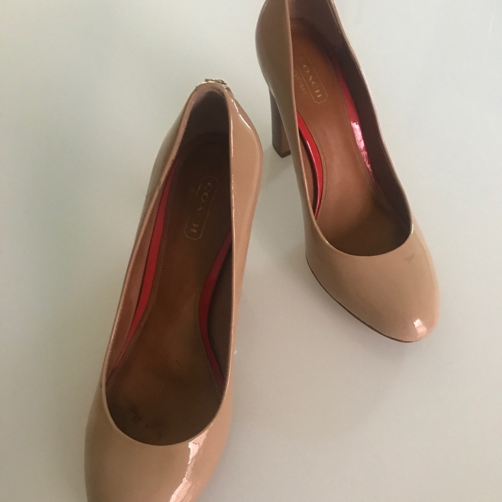 Nude patent leather Coach heels